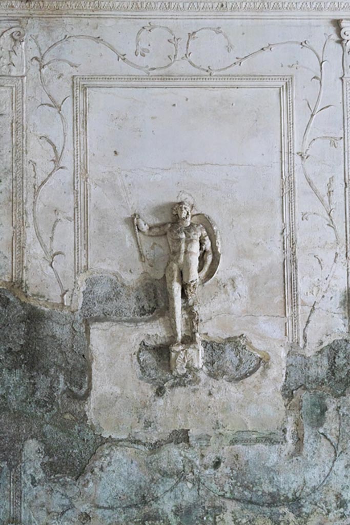 Herculaneum Suburban Baths. October 2023.
Tepidarium, stucco panel with warrior from north end of east wall. Photo courtesy of Johannes Eber.